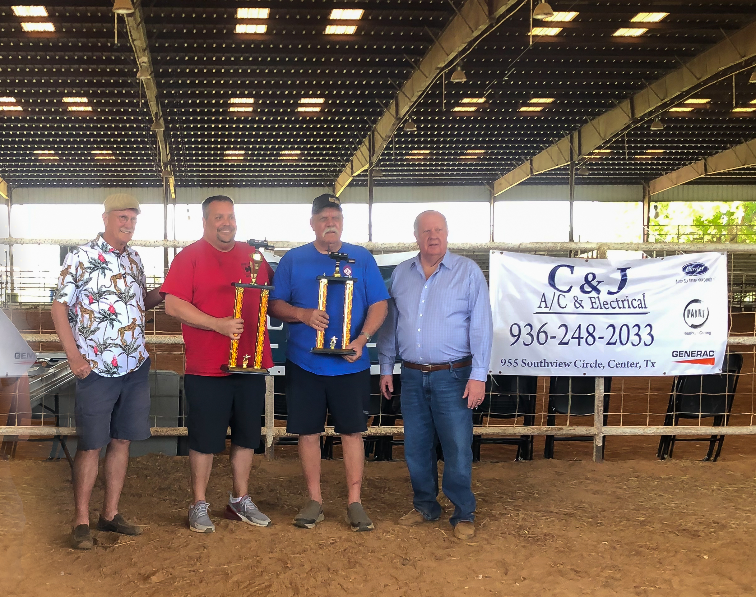 Grand Champion winner Shawn Moore (left) and Grand Reserve Champion David Lefler pose with City Council member Howell Howard and Mayor Chadwick after Saturday’s Grill Fest. 