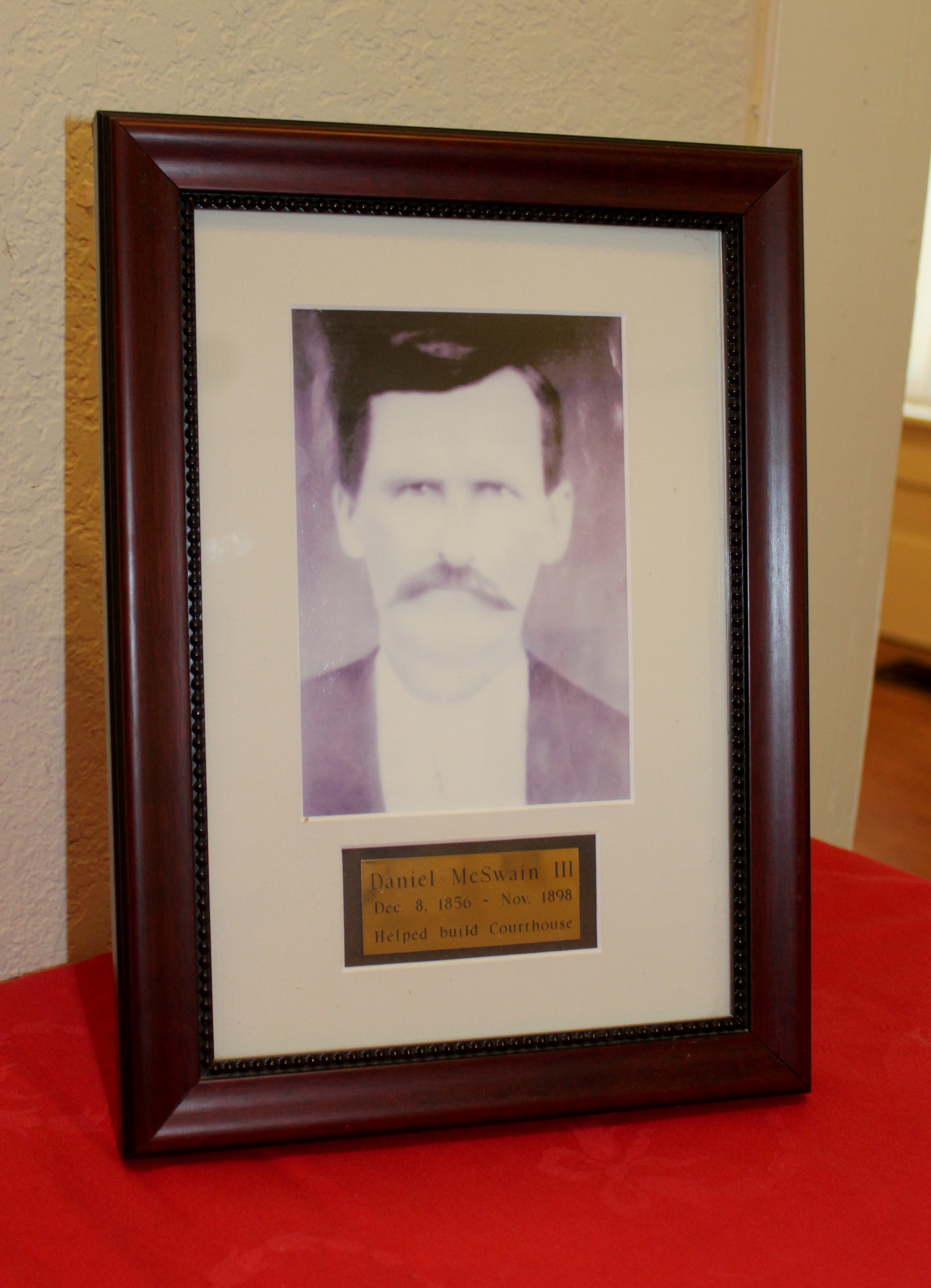 Loving's 1923 photo and Lawrence Davis's 2023 commemoration photo on display at the museum. 