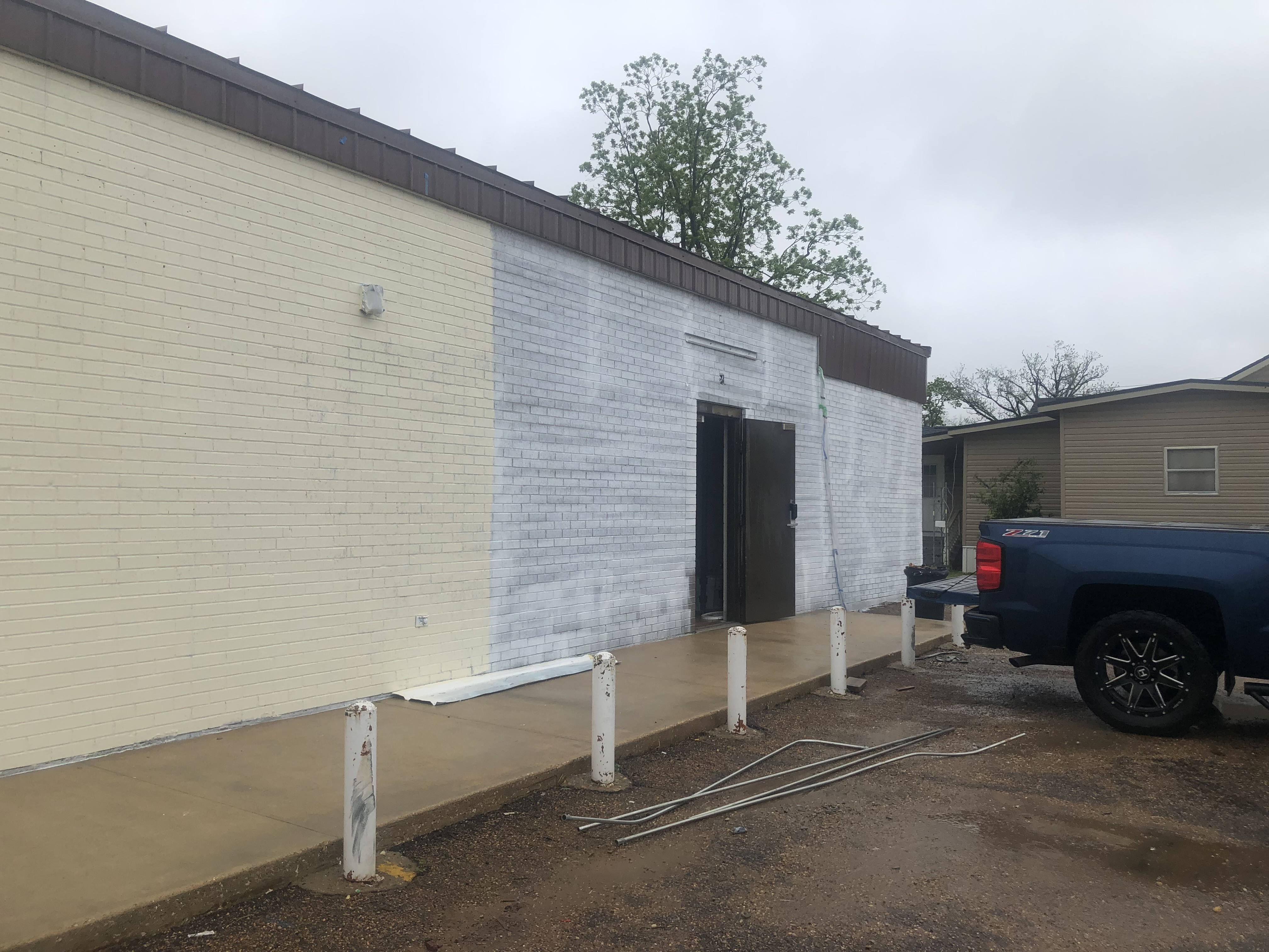 The old police station undergoes renovations as it prepares to house the new telecommunications company.