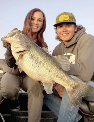 Fishing guide Dalton Smith (right) also put Powell on a 10.58 pounder that slammed her crankbait. She cracked her personal best twice in two days. (Courtesy Photo/Dalton Smith)