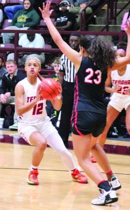 Kayanna Cox leaves one defender on the floor as she prepares for a jump shot in Tenaha’s regular season action earlier this year. (File photo by Colton Bragg)