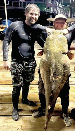 Noodlers recount cave brawl with 98.7 pound flathead, 14 feet down