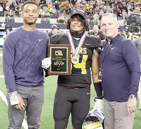 Named Most Valueable Player for the Bears defense is #14 Tyler Lane being presented the UIL award in Arlington, Texas. Talor Bragg | The Light and Champion