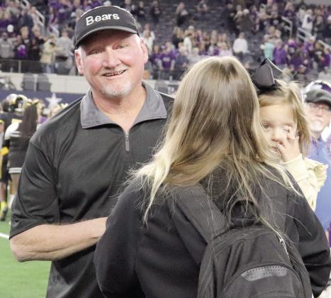 Timpson Head Coach Kerry Therwhanger with his Daughter-in-law and granddaughter after the final whistle blew on the Timpson Bears first state championship win. Taylor Bragg | The Light and Champion