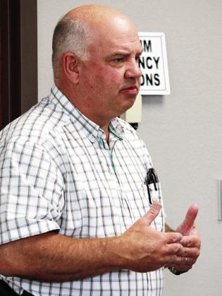 Shelby County Sheriff’s Department Chief Deputy Mike Hanson requests the commissioners court approve a police academy training program for jail employees. Lisa White | Light and Champion