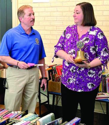 Rotary Club President Steve Waters, joined by Rotary Member Hollie Adams, commented on the library’s Redditt Room renovations.