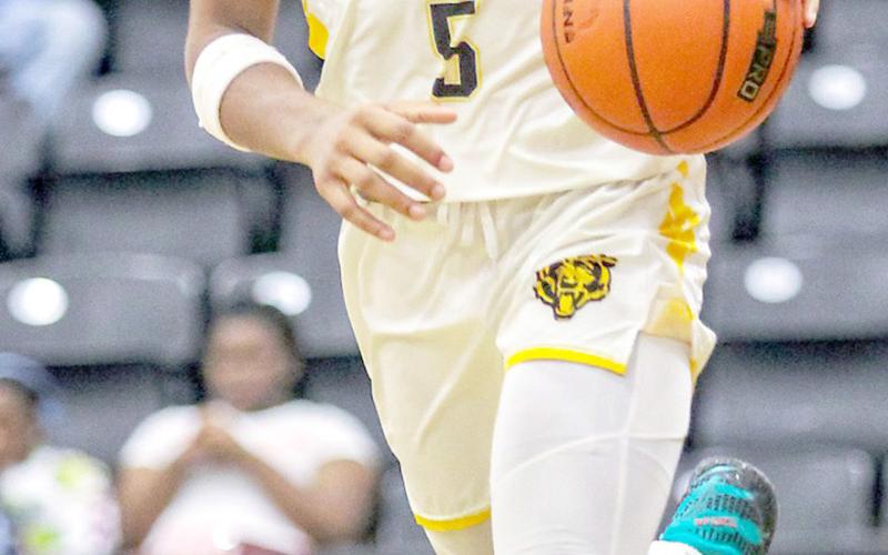 Albert Parker of Timpson brings the ball upcourt against the Waskom Wildcats on Friday, Jan. 9. Savannah Cassell Timpson ISD Student Media Intern