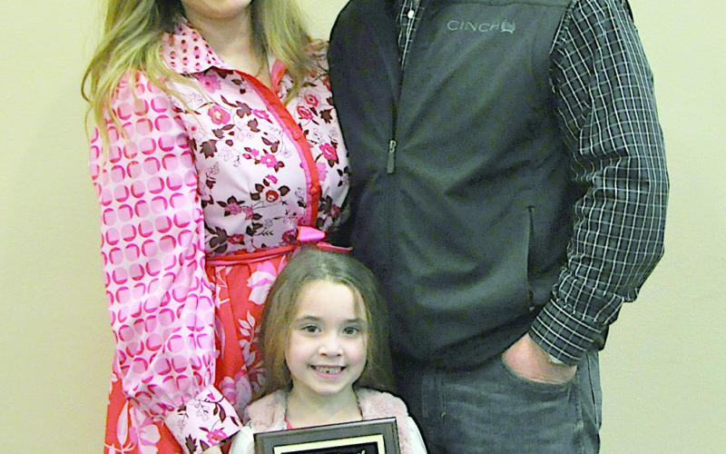 Lauren Bonner won the Young Citizen of the Year Award, she is pictured with her family. Zack Clark | The Light and Champion