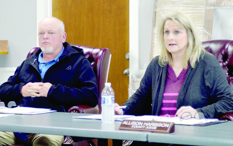 Roscoe McSwain, Comm. Pct. 1, and Shelby County Judge Allison Harbison participate in the Shelby County Commissioners’ Court meeting held last week. David Danley | Light and Champion