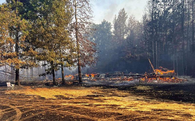 q Several wildfires in the East Texas area have burned hundreds of acres of grass and woodlands, plus many homes and other structures. (JVFD photo)