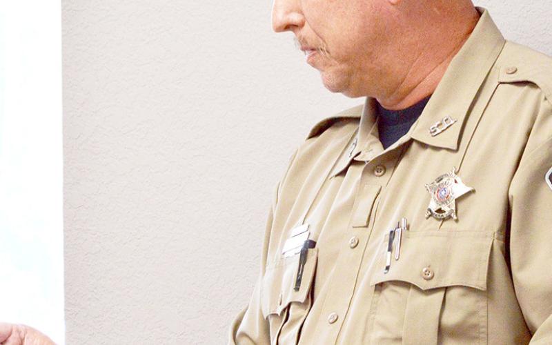 Chris Davis, Shelby County courthouse security officer discusses a security system for the Shelby County Juvenile Probation Department. Zack Clark | Light and Champion
