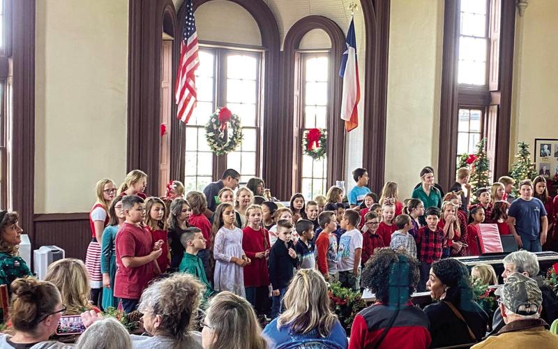 Excelsior choir performs at Christmas Open House