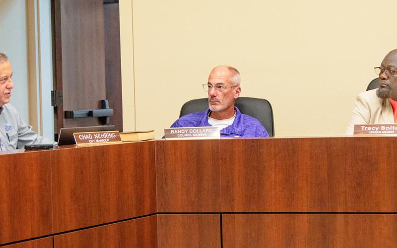 Councilmen Dr. Randy Collard (middle) and Tracy Bolton listen while Center City Manager Chad Nehring (left) updates the council on happenings in the city of Center. David Danley | Light and Champion