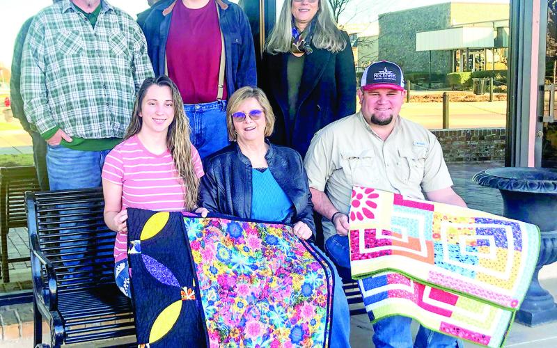 Quilt raffle winners meet Mason