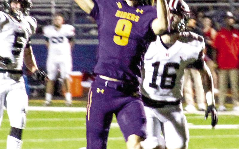 Tight end Colby Lout (9) reaches for an Emonte Cross pass on his way to scoring on a 21-yard touchdown capping a 13play drive. (Leon Aldridge photo/The Light and Champion)