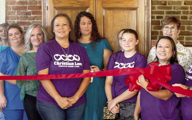 Christian Love ribbon cutting