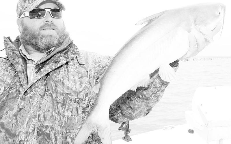 Cedar Creek fishing guide Jason Barber says windy banks and points with stumps and other cover are good places to look for fall and winter catfish in shallow water. Photo by Matt Williams