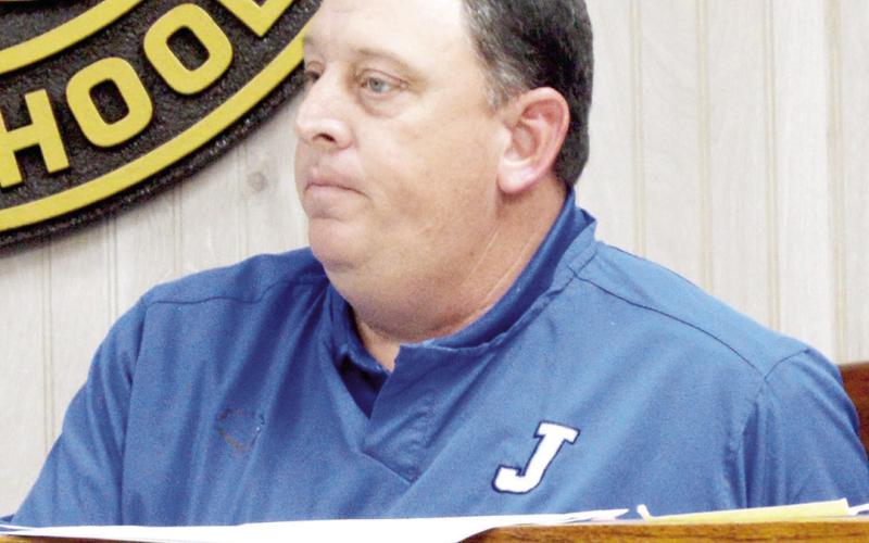 Superintendent Ryan Fuller listens to a report being given at the Joaquin ISD board meeting held on Monday evening. David Danley | Light and Champion