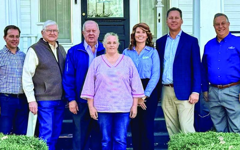 Etex Communications officials joined with Center city officials Mayor David Chadwick, Council Member Terry Scull and City Manager Chad Nehring and Shelby County Today owner J.J. Ford last week to activate the first customer in Center. The Light and Champion