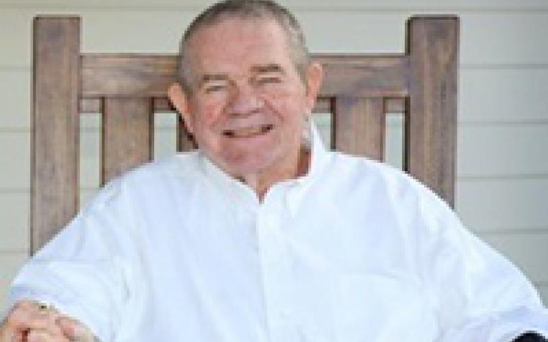 Mac Warren, 74, of Center