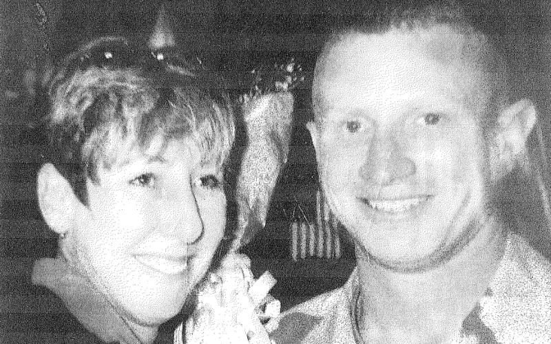 A submitted photo of author Leroy Cooper and his mother on the day of returning from Iraq in 2004