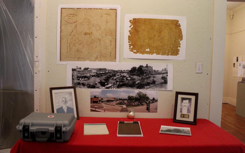 The new exhibit featuring Roy R. Loving's 1923 photo and Lawrence Davis's 2023 commemoration photo.