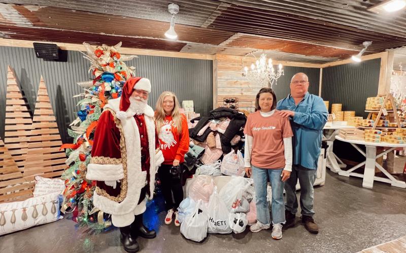 White Cottage Mercantile and Snell Photography collecting Coats for Kindness