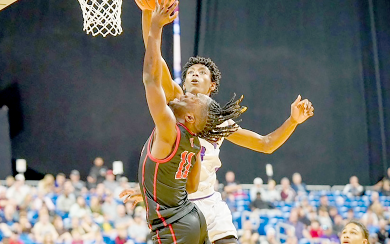 UIL | The Light and Champion D.J. Barns lays up for two against the Thrall Tigers. D.J. Barnes - 23 pts, 4 Assists helping his team to the 2024 UIL 2A State Championship