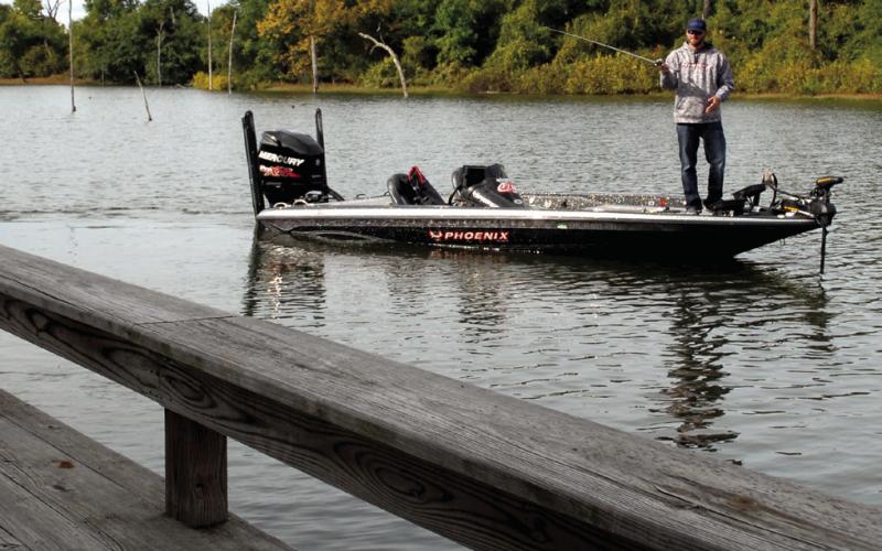Pitching and sidearm roll casting are ideal for placing baits beneath boat docks or tight to targets like stumps, bushes or dock supports. (Photo by Matt Williams)