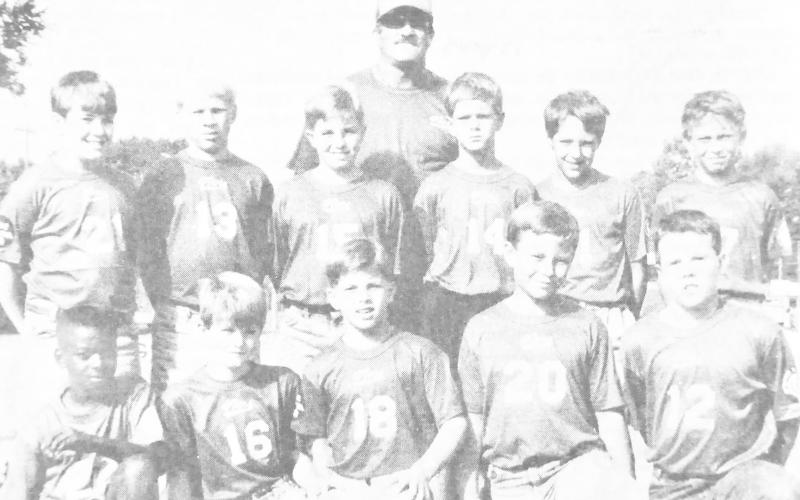 Members of the Center 49s Division I Flag Football team are (front, left) Allen Collins, Dustin Taylor, Collin McElroy, Coy Campbell and Shelby Stennett; (back, left) Matt Foster, Nickolas Friant, Jeremy Smith, Randall Pritchett, Michael Titman and Daniel Emanis; coach is Randy Clark. Not pictured are Doug Eaves, Ronald Roden and coaches Mike Walker and Joe Jackson.