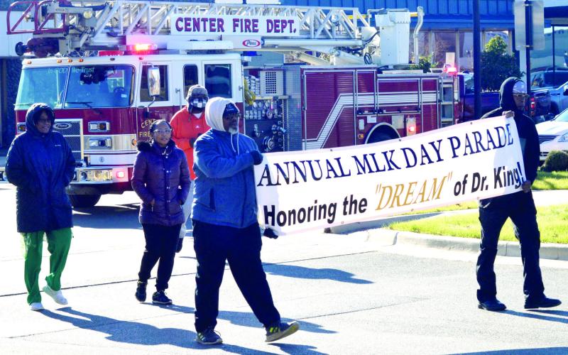 The Rev. Martin Luther King, Jr., was honored with a march originating on the Center square before proceeding to Abundant Love Ministries where a memorial service was held. David Danley | The Light and Champion