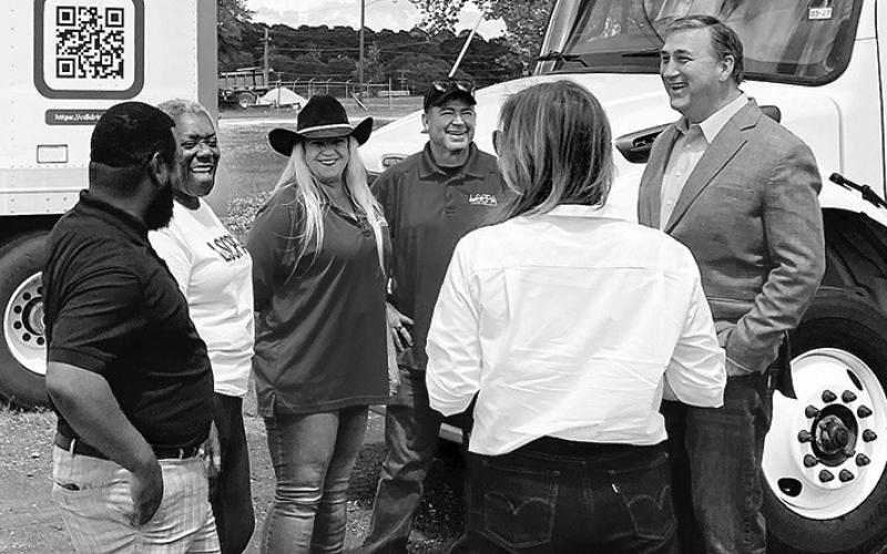 U.S. Rep. Nathaniel Moran visits with students at Pineland Commercial Driving Academy. Moran recently assisted the facility in obtaining $1.1 million in federal funding that will help provide training for training up to 50 students a year and assist them with job placement after graduation. Submitted | Light and Champion