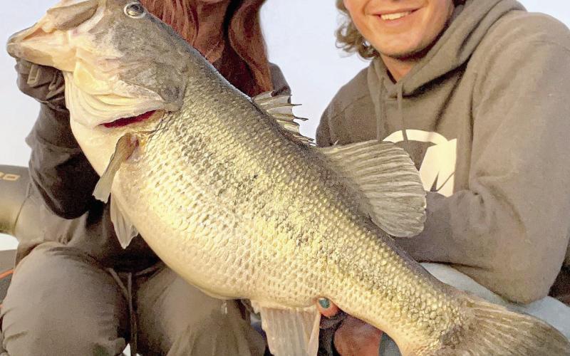 Fishing guide Dalton Smith (right) also put Powell on a 10.58 pounder that slammed her crankbait. She cracked her personal best twice in two days. (Courtesy Photo/Dalton Smith)
