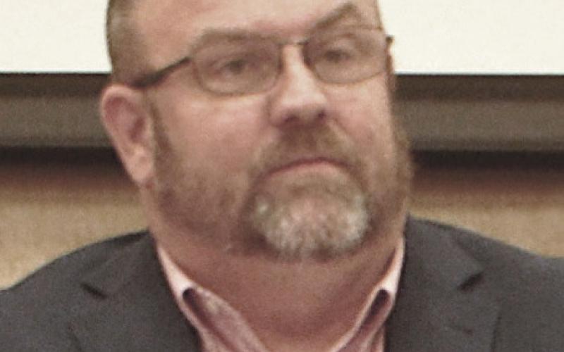 Center ISD Superintendent Dr. Brian Morris listens to a report from Casey Ashley, elementary school counselor, at the Dec. 12 meeting of the district school board. Zack Clark | Light and Champion