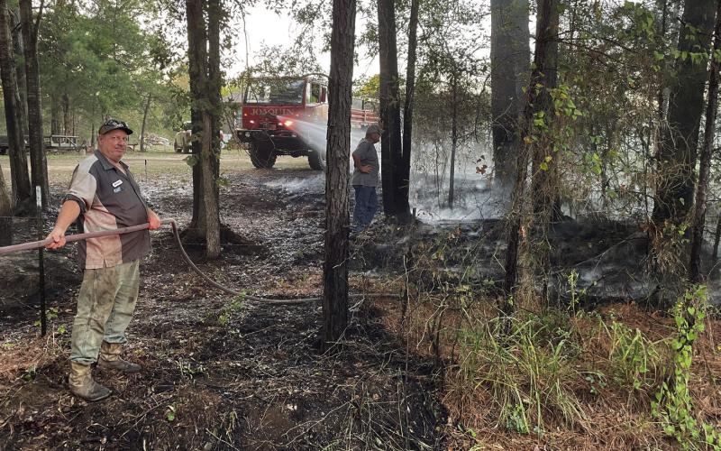The Joaquin Volunteer Fire Department was called to extinguish three brush fires cause by burning trash between Oct. 15 and 21. (Courtesy photo by Joaquin Volunteer Fire Department)