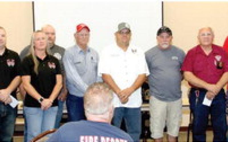 The Center Noon Lions Club donation was presented by Roger Doyle (far left) and Lions Club President Clay Ihlo (far right).The Hochheim Prairie donation was presented by board member (far right) Clay Ihlo who also serves on the Hochheim Prairie board or directors.
