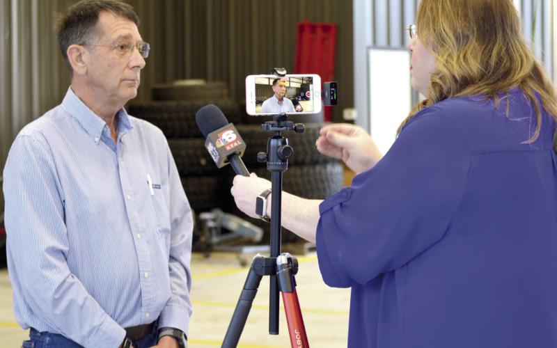 Terry Allen is interviewed by KTAL reporter Lynn Vance at the Elysian Fields meeting. Media all across the state and beyond are starting to report on the grassroots efforts to oppose the opening and operating of certain solid waste disposal sites claimed to be sources of groundwater contamination. David Danley | Light and Champion