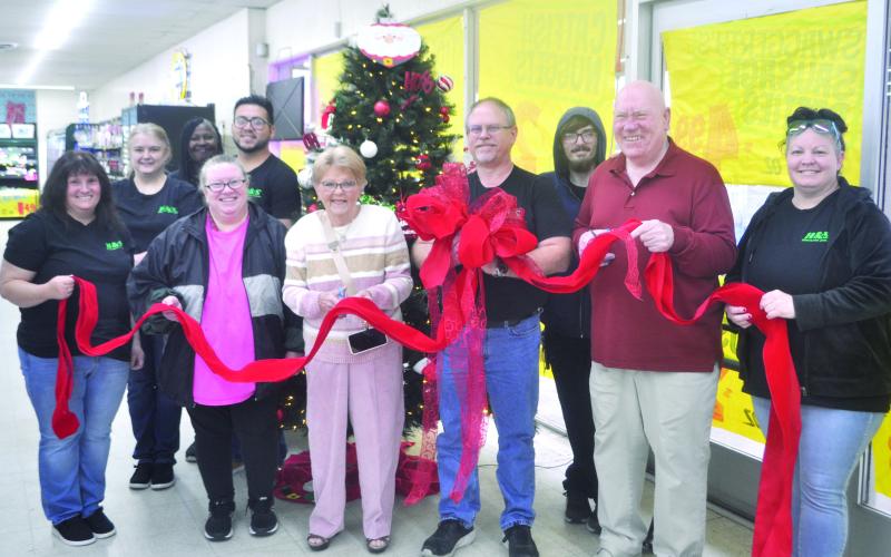 H&amp;amp;S Discount Foods of Center, Texas, celebrated their 50-Year anniversary this past Wednesday, December 4, 2024 with a ribbon cutting in front of the stores Christmas Tree. In photo is: Wayne and Kathy Hagler, Bill and Leanne Dickinson, Rose Parks, Brandon Cobart, Idell Bell, Jeanie Tyler, Gabriel Solis, Pam Askew. Not in photo is Clint Crocker, Logan Sanford, Richard Harrison, Loretta Felder, April Alexander. Dennis H. Phillips | The Light and Champion