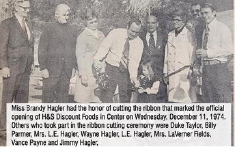Miss Brandy Hagler had the honor of cutting the ribbon that marked the official opening of H&amp;amp;S Discount Foods in Center on Wednesday, December 11,1974. Others who took part in the ribbon cutting ceremony were Duke Taylor, Billy Parmer, Mrs. L.E. Hagler, Wayne Hagler, L.E. Hagler, Mrs. LaVerner Fields, Vance Payne and Jimmy Hagler.