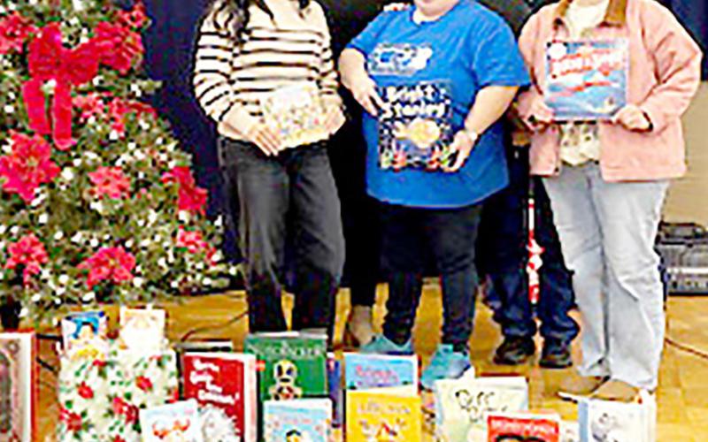 Members of the Center Women’s Reading Club donated books to the Operation Blue Santa and Cookies &amp;amp; Cocoa groups. Representing the groups at the meeting were (left to right) Amanda Radney, Joanna Lopez, Amy Lindley, Charlene Jackson and Baylea Cockrell Submitted | Light and Champion