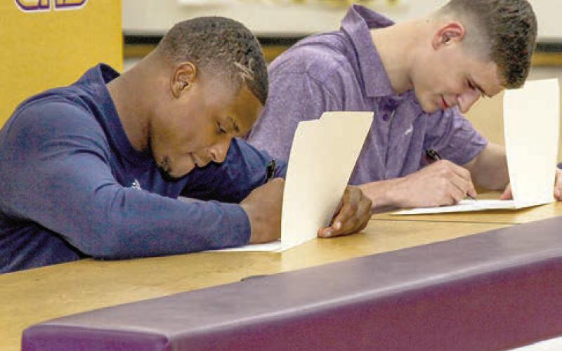Kaden Dixon and Lance Wilburn put pen to paper Wednesday, signing letters of intent to play college football. Dixon is going to Northern Arizona University, and Wilburn is going to Stephen F. Austin State University.
