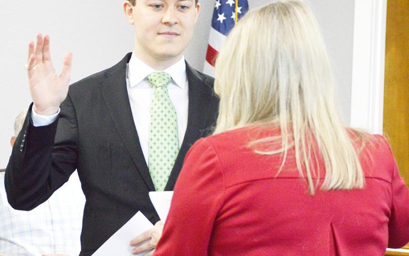 Shelby County Judge Allison Harbison swears in Brady Wells as a lawyer and officer of the court. Zack Clark | Light and Champion
