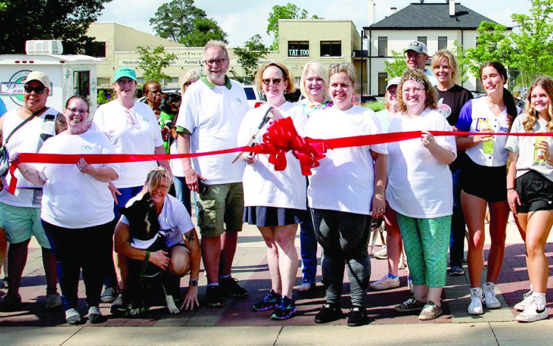 A Chamber of Commerce New Member Ribbon Cutting for Happy Tails Adoption Center preceded a slate of activities including a Bark-A-Rama Wag N’Walk on the downtown square.