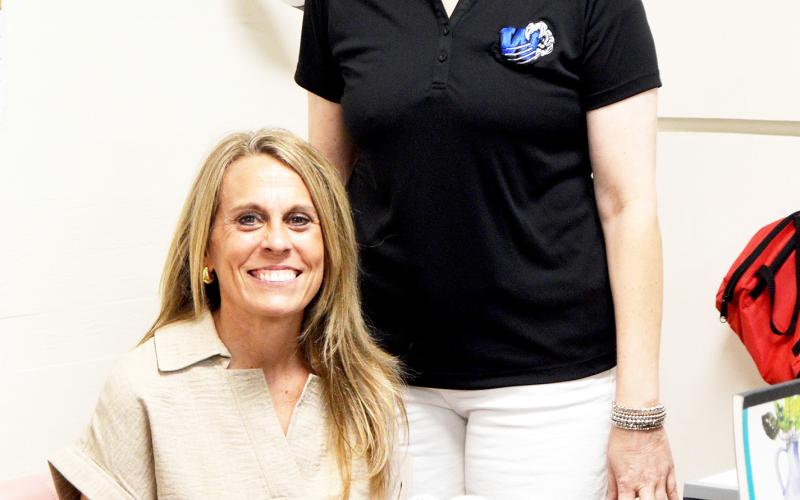 Roni Waller (seated), Excelsior principal, and Sheila Cobb, assistant principal, look to the future as the district prepares to offer a high school for the first time in its history. David Danley | Light and Champion