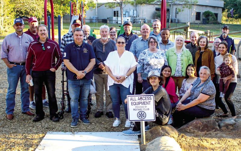 Rotarians enjoy a Family Day to celebrate the completion of the local civic club’s ADA Inclusive Playground Equipment addition to Portacool Park. (Courtesy Photo / Rotary Club of Center)