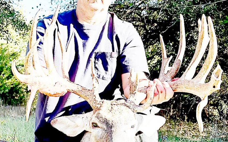 Kaufman County hunter Courtland Sewell of Scurry with the remarkable 22-pointer he shot on Nov. 9. Courtesy photos, Courtland Sewell and Kyle Schlee
