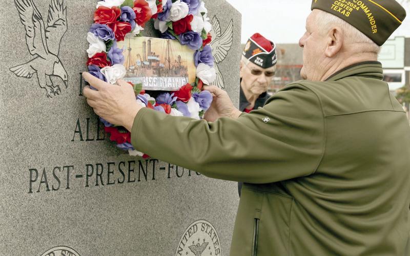 Post Senior Vice Commander Mike Wulf placed the post’s memorial wreath on the Veteran’s Memorial in remembrance of the U.S.S. Maine and the Spanish- American War. Leon Aldridge | The Light and Champion