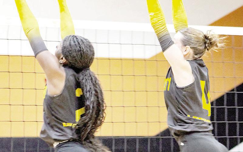 Lady Bears players Maliah Norris (left) and Paige Molloy (right) go up for a block during Timpson’s round two playoff match against the Detroit Lady Eagles last week. The Lady Bears took the Lady Eagles to five sets, but dropped the final one, ending their season. Savannah Cassell | Timpson ISD Student Media Intern