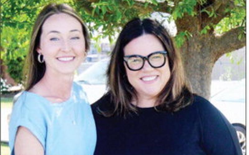 Anna Register, Program Director (left), and Denise Merriman, Executive Director, of the Shelby County Children’s Advocacy Center, lead a team of professionals that address child abuse issues in Shelby and San Augustine counties. David Danley | Light and Champion