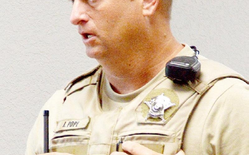 Constable Pct. 5 John Pope updates the commissioners court on the search for a new deputy constable for his precinct. Zack Clark | Light and Champion